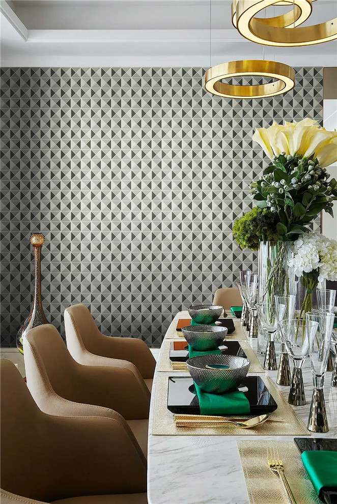 Example of a trendy dining room design in Orange County with multicolored walls