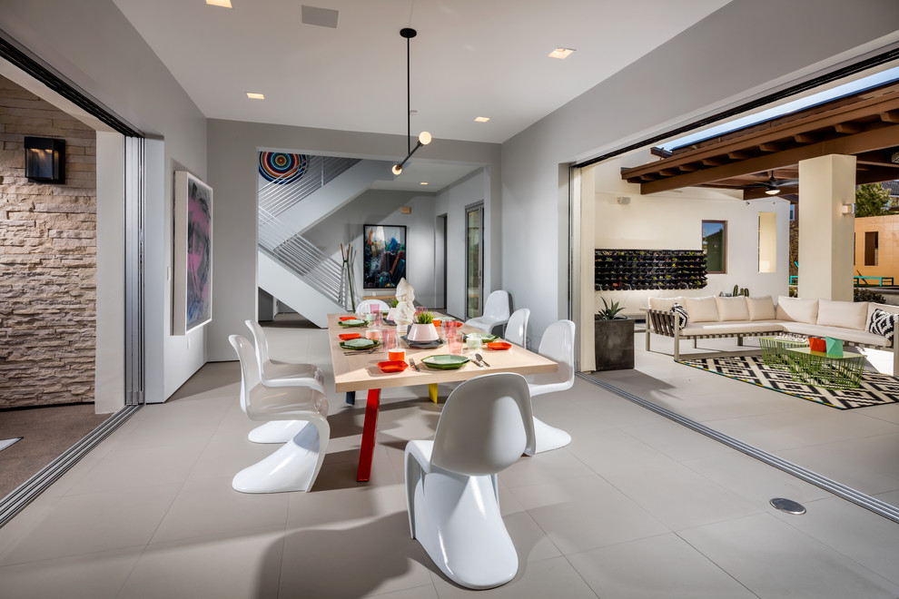 Inspiration for a contemporary dining room in Los Angeles with grey walls.