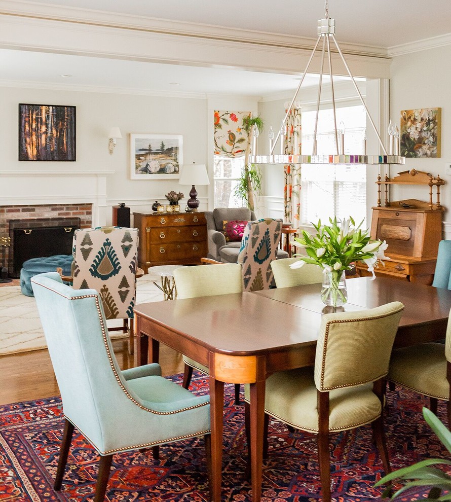 Elegant medium tone wood floor dining room photo in Boston