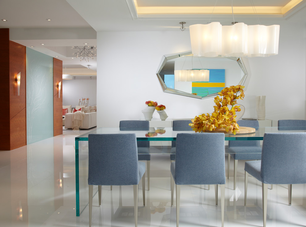 Large trendy marble floor and white floor kitchen/dining room combo photo in Miami with white walls