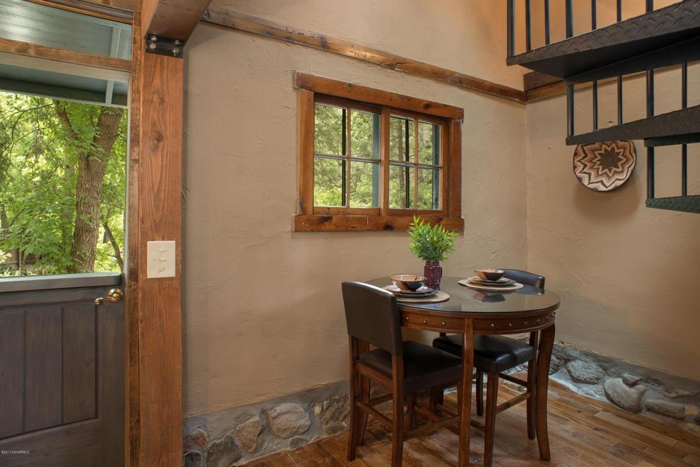 Photo of a rustic dining room in Phoenix.
