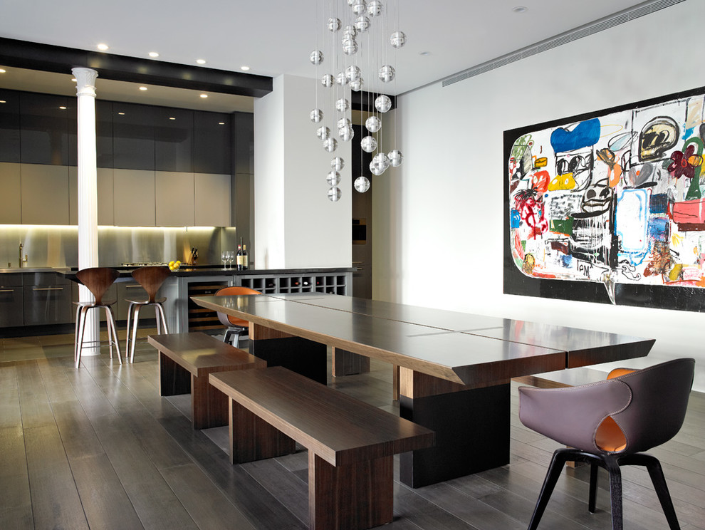 Photo of a contemporary dining room in New York with white walls and dark hardwood flooring.