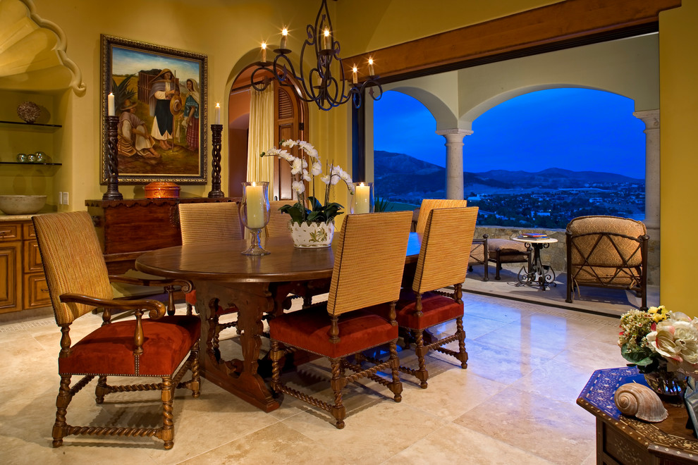 This is an example of a mediterranean dining room in Baltimore with yellow walls.
