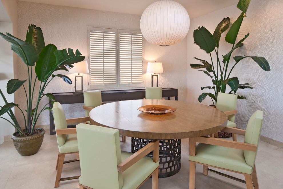 Example of a trendy dining room design in Los Angeles with white walls