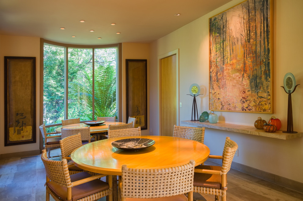 Contemporary dining room in San Francisco with beige walls.