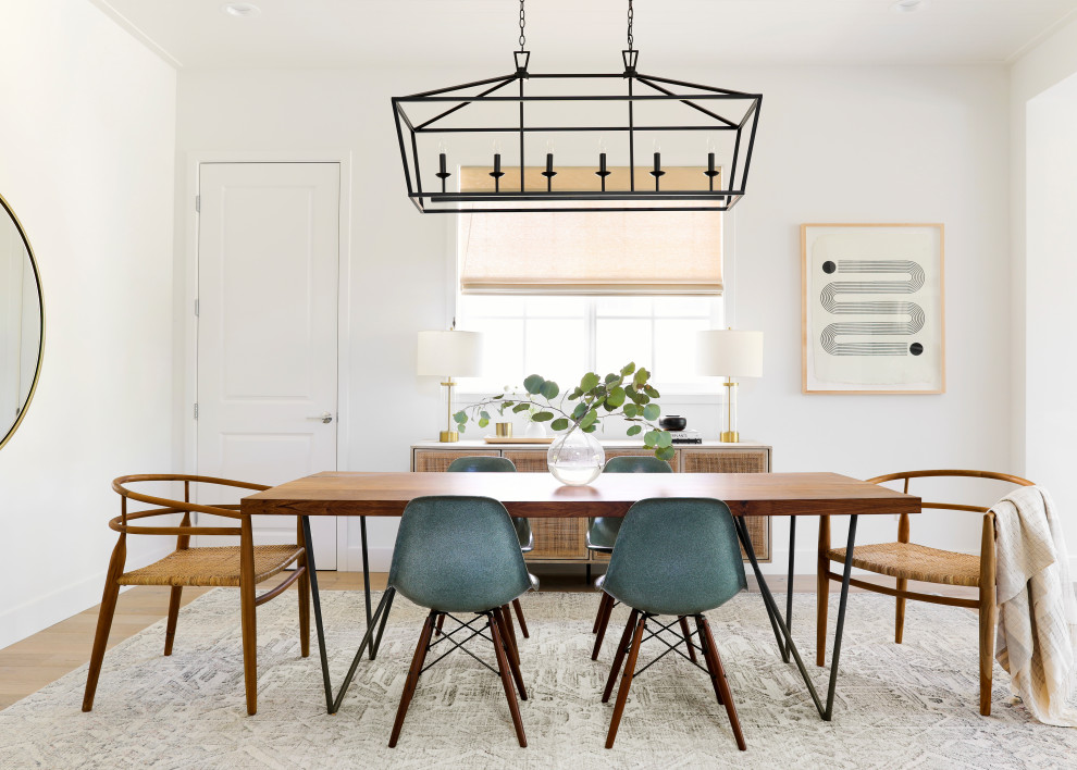 Inspiration for a contemporary light wood floor dining room remodel in Los Angeles with white walls