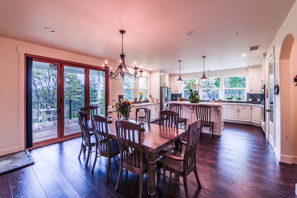 Inspiration for a mid-sized timeless dark wood floor and brown floor great room remodel in Sacramento with white walls