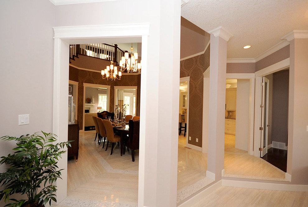 Medium sized classic enclosed dining room in Edmonton with brown walls, porcelain flooring and beige floors.
