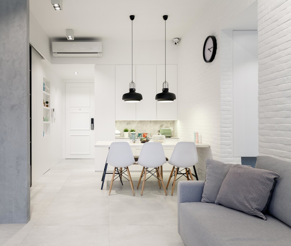 Immagine di una sala da pranzo moderna di medie dimensioni con pareti bianche e pavimento con piastrelle in ceramica