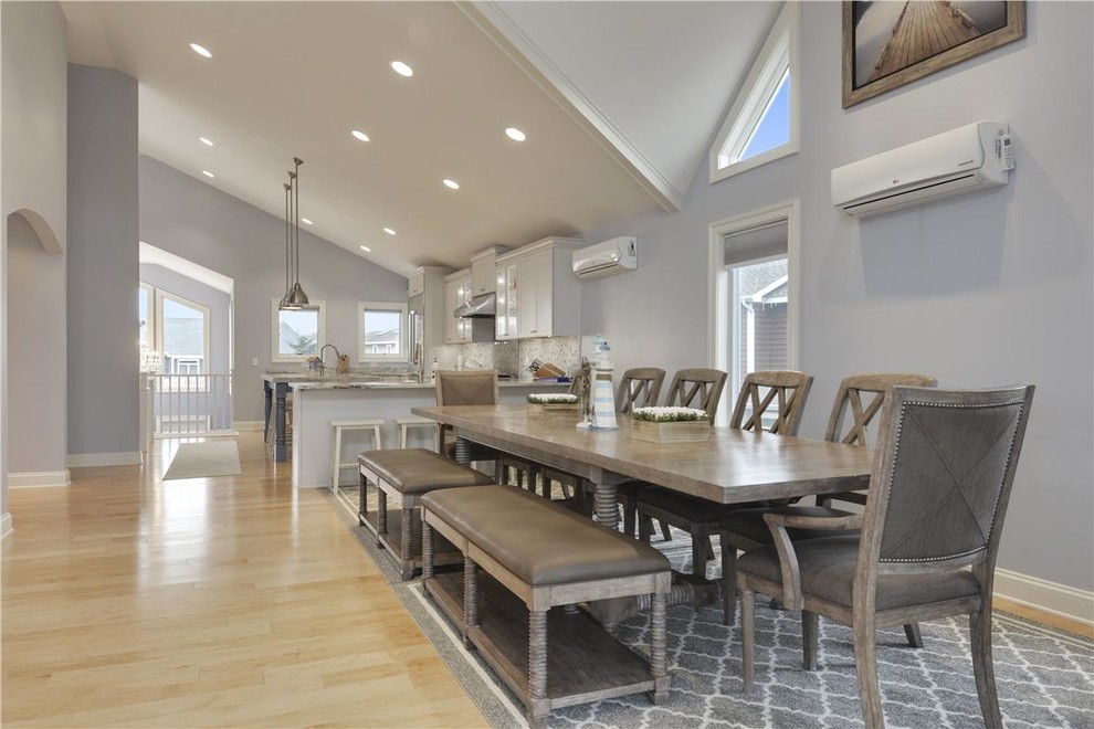 Design ideas for a medium sized nautical kitchen/dining room in Other with grey walls and light hardwood flooring.