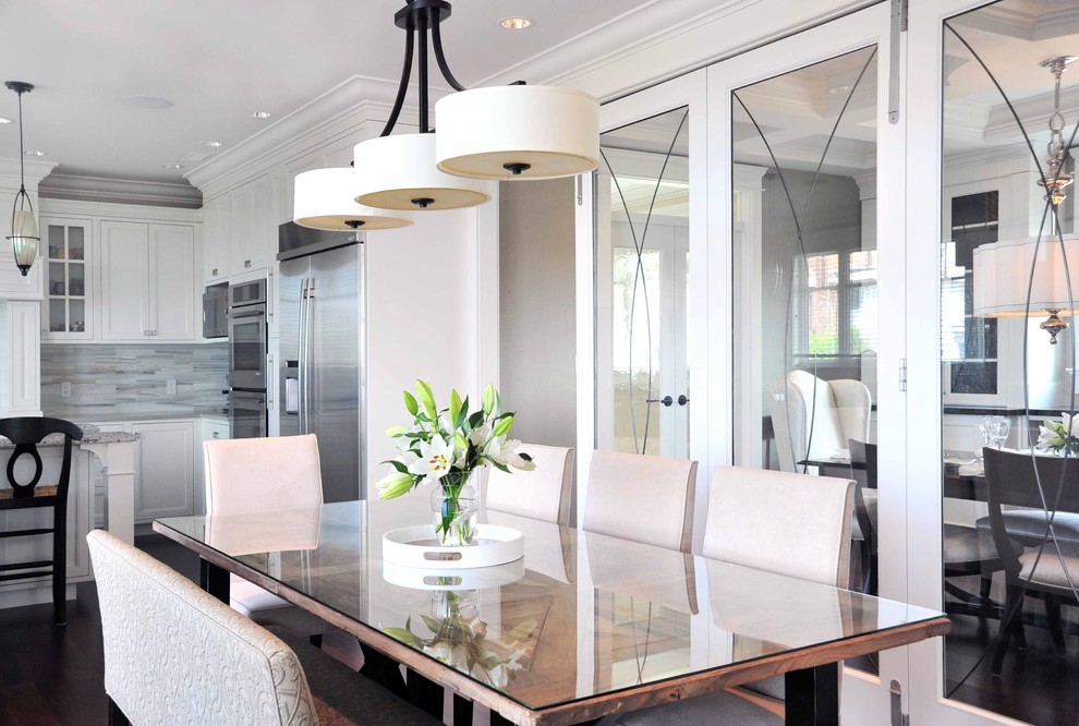 Example of a mid-sized transitional medium tone wood floor kitchen/dining room combo design in Vancouver with brown walls