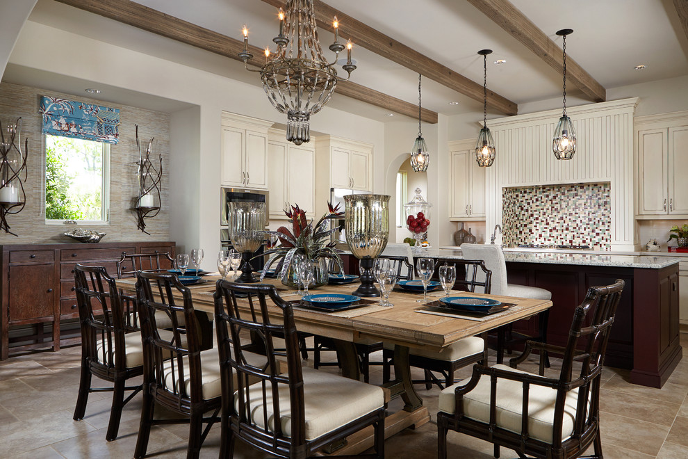 Example of an island style dining room design in Miami
