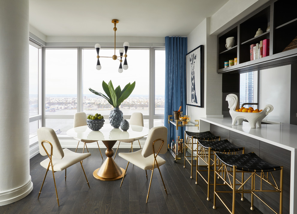 Trendy dark wood floor and brown floor dining room photo in New York with white walls
