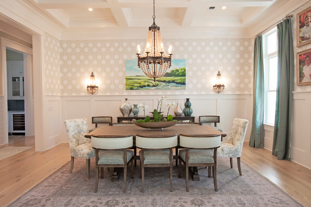 Example of a large classic medium tone wood floor enclosed dining room design in Atlanta with beige walls and no fireplace