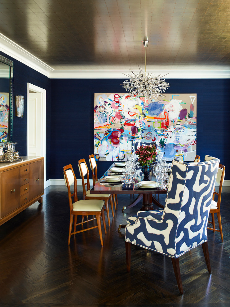 Design ideas for a contemporary enclosed dining room in New York with blue walls and dark hardwood flooring.