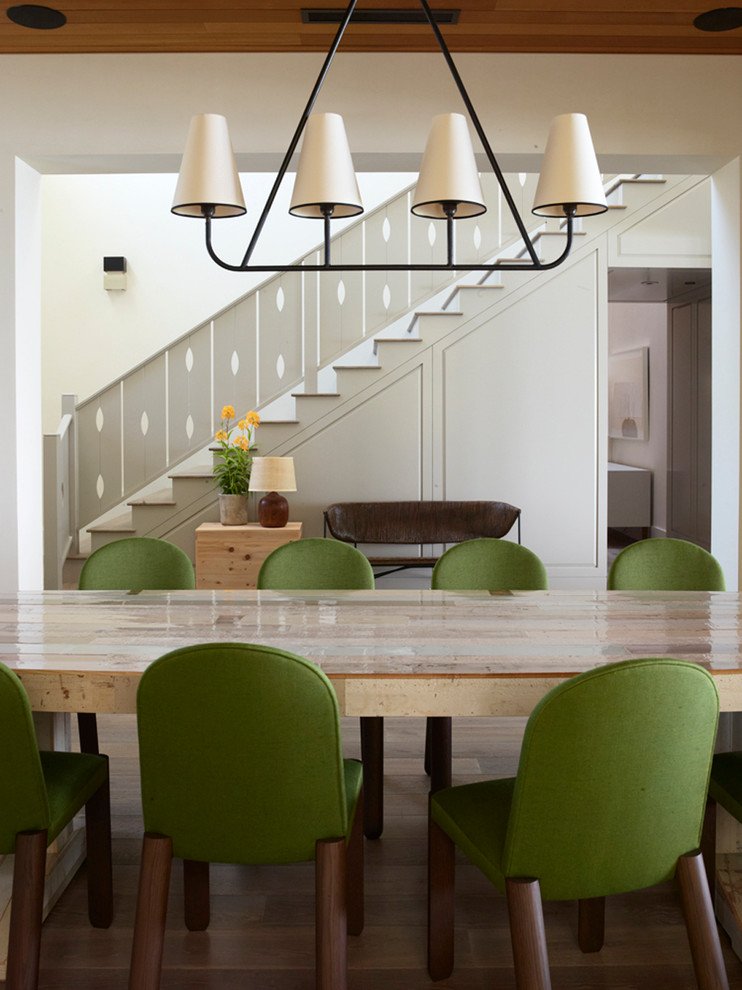 Dining room - contemporary dark wood floor dining room idea in Santa Barbara with white walls