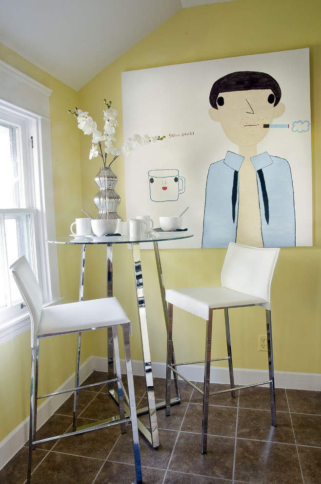 Eclectic ceramic tile dining room photo in Louisville with yellow walls