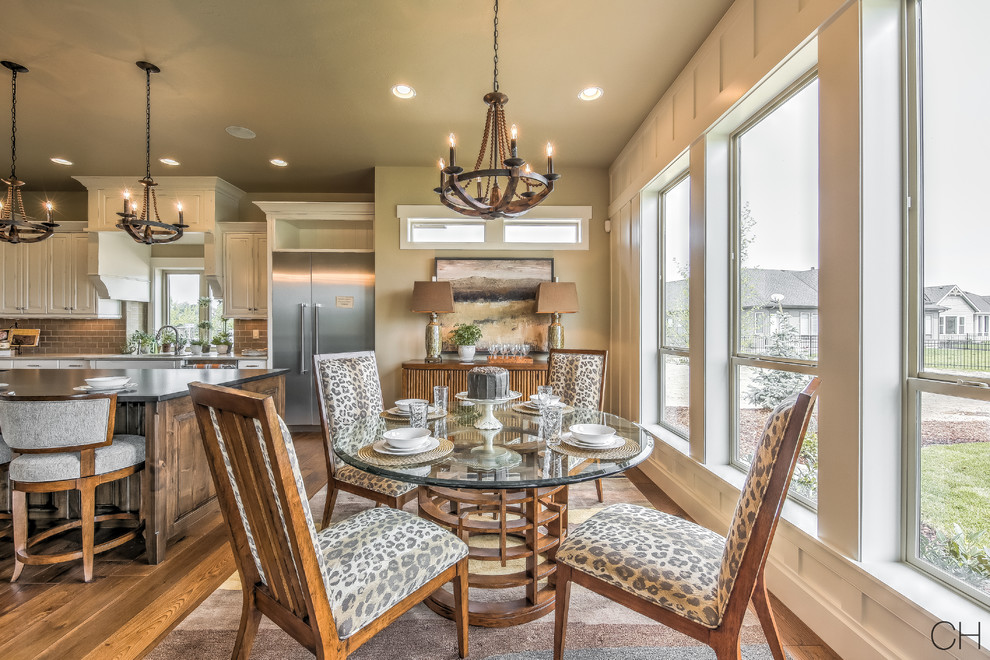 Example of a mid-sized trendy dark wood floor and brown floor kitchen/dining room combo design in Orange County with beige walls and no fireplace