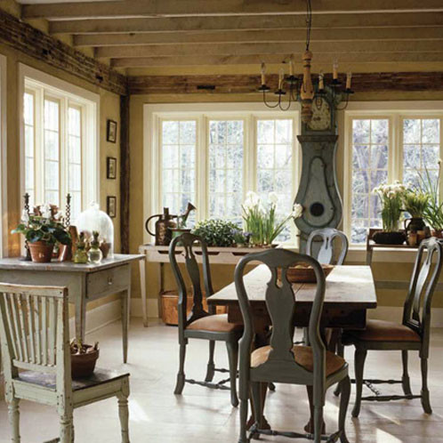 Inspiration for a large timeless light wood floor kitchen/dining room combo remodel in New York with yellow walls and no fireplace