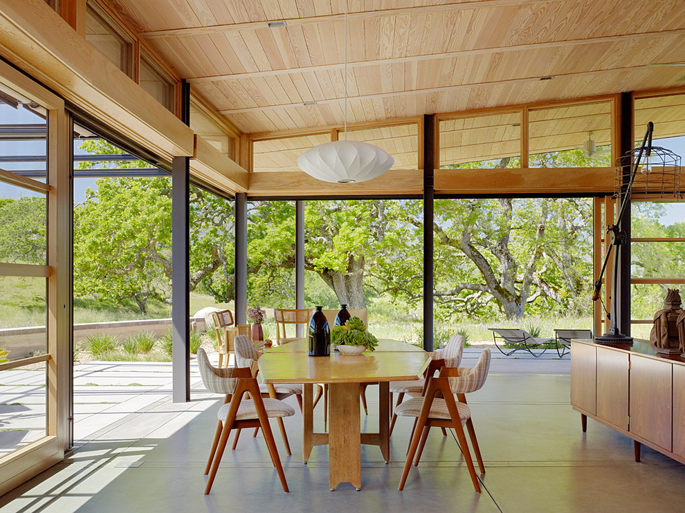 Inspiration for a midcentury open plan dining room in San Francisco.