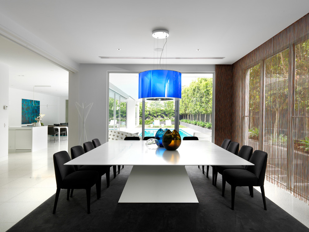 Design ideas for a contemporary dining room in Melbourne with white walls.