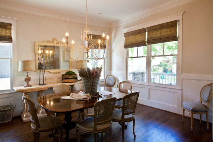 Mid-sized elegant dark wood floor enclosed dining room photo in Houston with beige walls