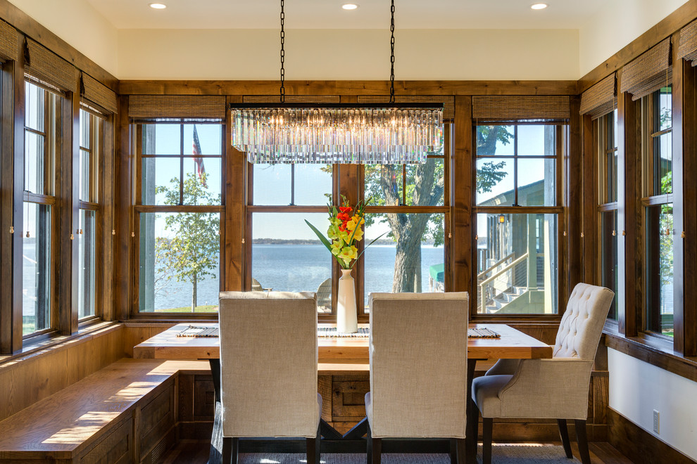 This is an example of a medium sized rustic dining room in Minneapolis with white walls and no fireplace.