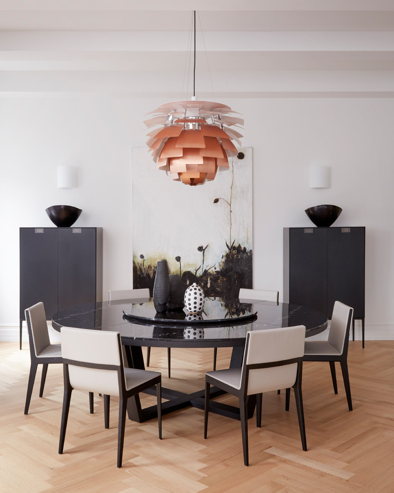 Inspiration for a classic dining room in Other with white walls, light hardwood flooring and brown floors.