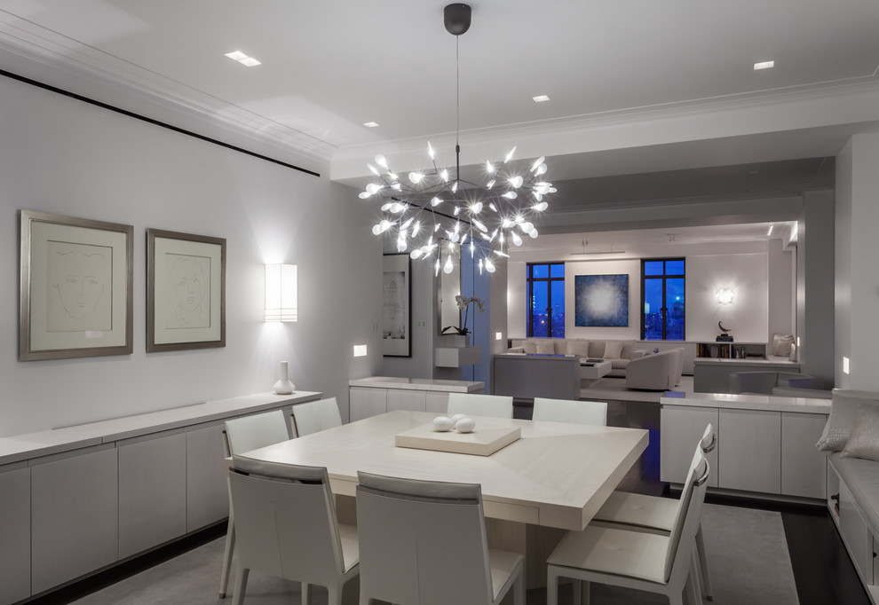 Photo of a large modern open plan dining room in New York with white walls.