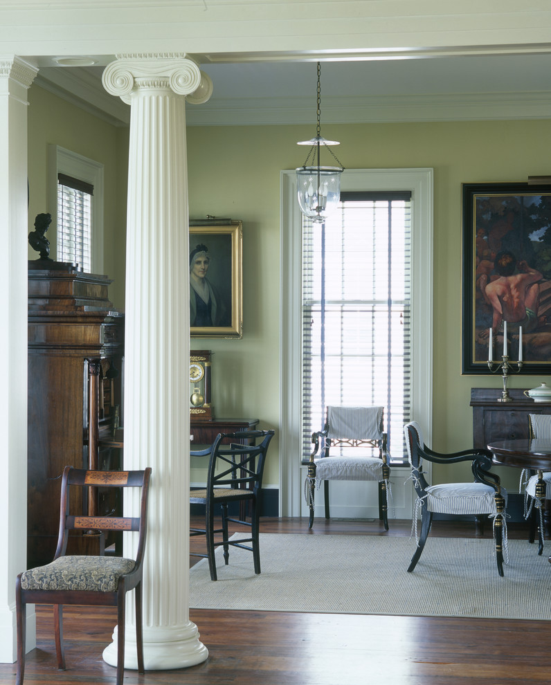 Inspiration for a traditional dining room in Wilmington with beige walls and dark hardwood flooring.