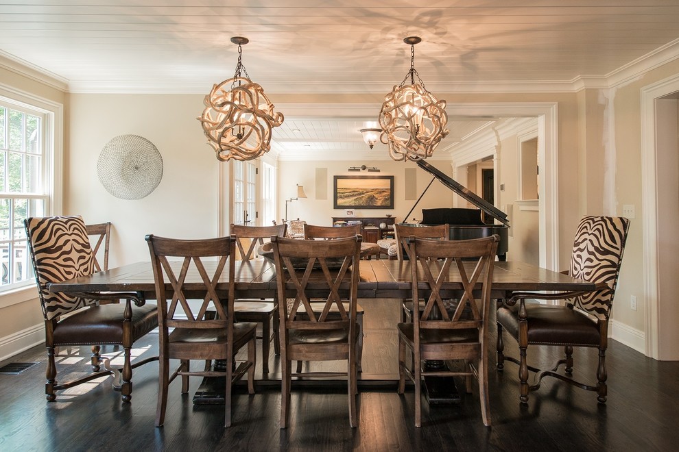 Mid-sized beach style dark wood floor enclosed dining room photo in New York with beige walls and no fireplace