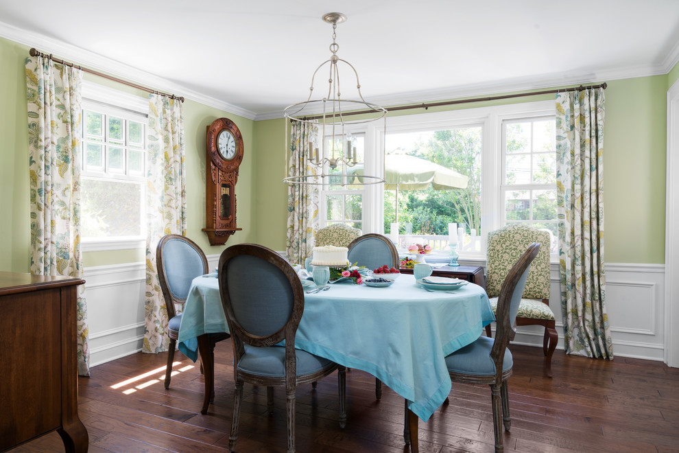 Photo of a medium sized traditional enclosed dining room in Philadelphia with green walls, medium hardwood flooring and brown floors.