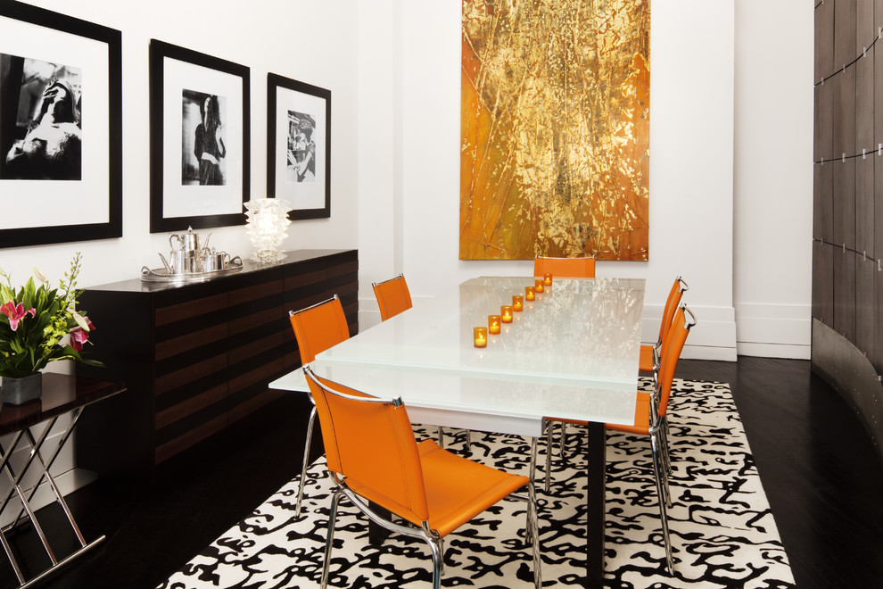 Inspiration for a modern dark wood floor dining room remodel in New York with white walls
