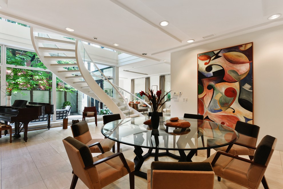 Photo of a contemporary dining room in Chicago with white walls and no fireplace.