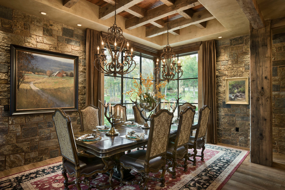 Photo of a rustic dining room in Other with dark hardwood flooring.