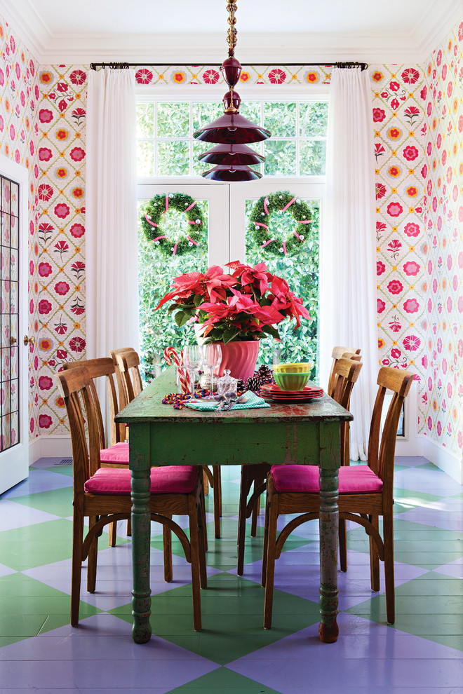 Eclectic painted wood floor and multicolored floor enclosed dining room photo in Los Angeles with multicolored walls