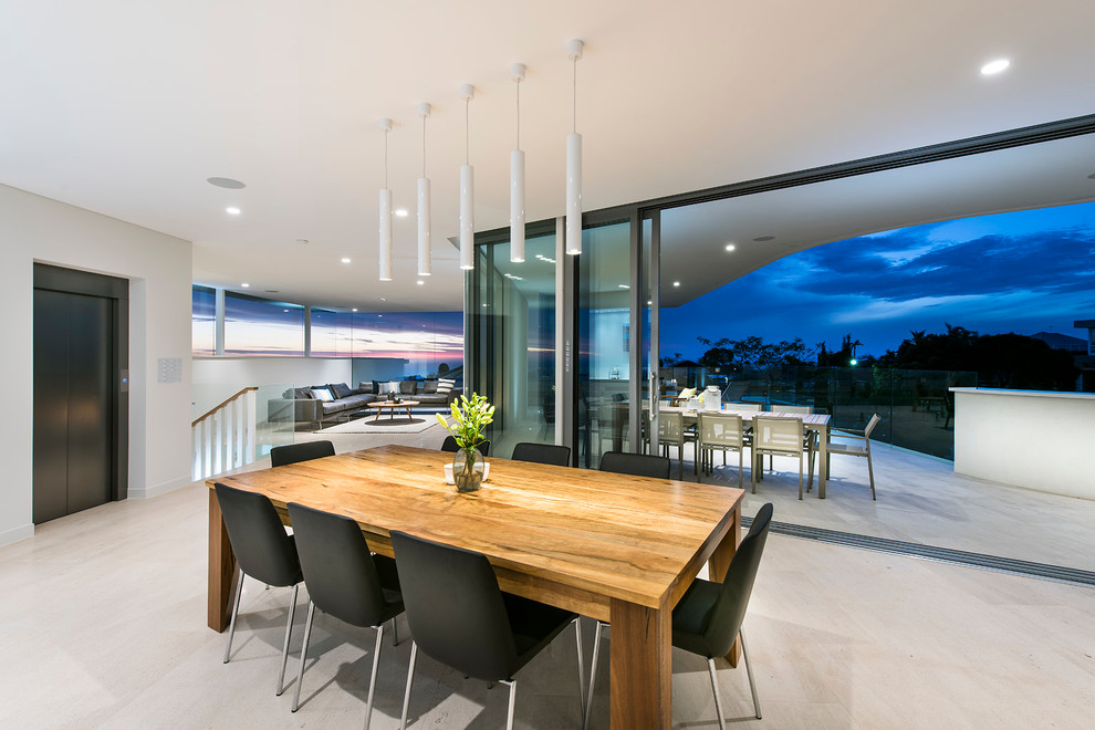 Example of a huge minimalist kitchen/dining room combo design in Perth with white walls