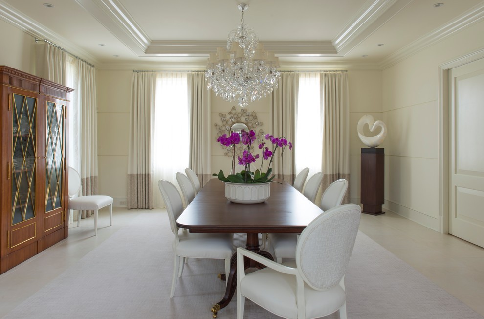 This is an example of an expansive traditional enclosed dining room in DC Metro with beige walls and no fireplace.