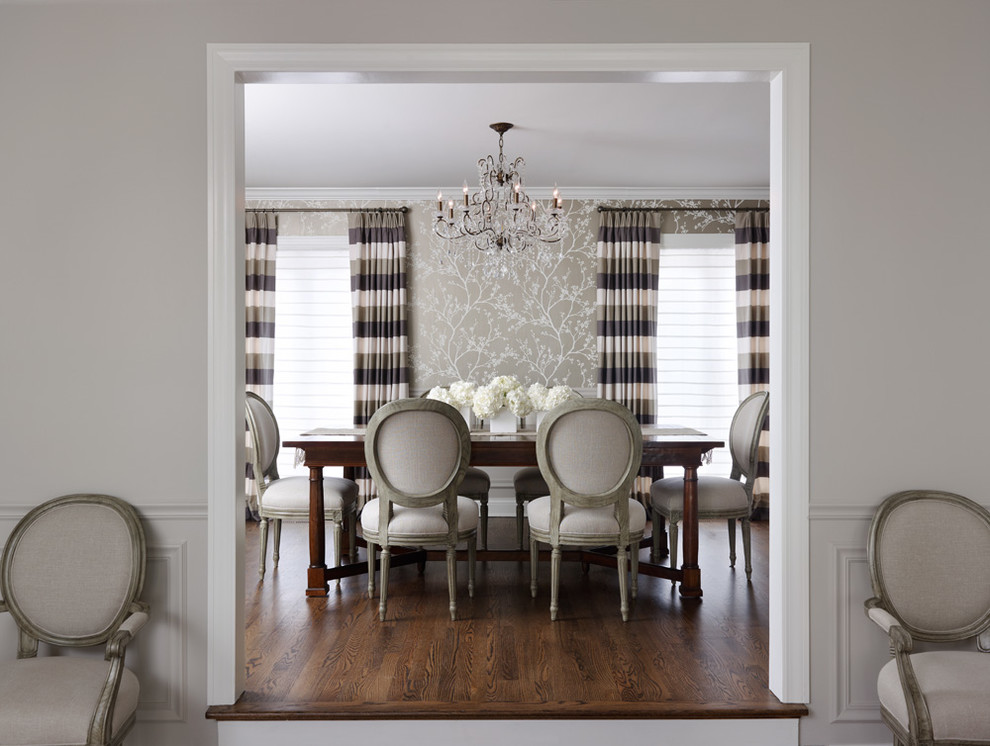 Large elegant dark wood floor and brown floor enclosed dining room photo in Chicago with beige walls and no fireplace