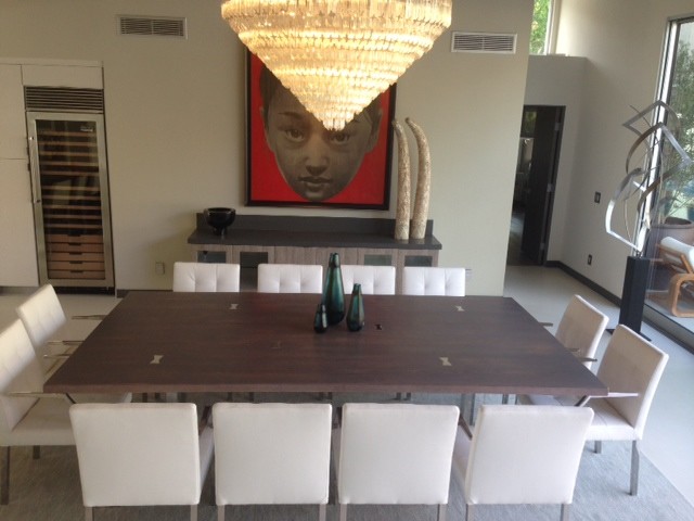Photo of a large dining room in Orange County with beige walls and lino flooring.