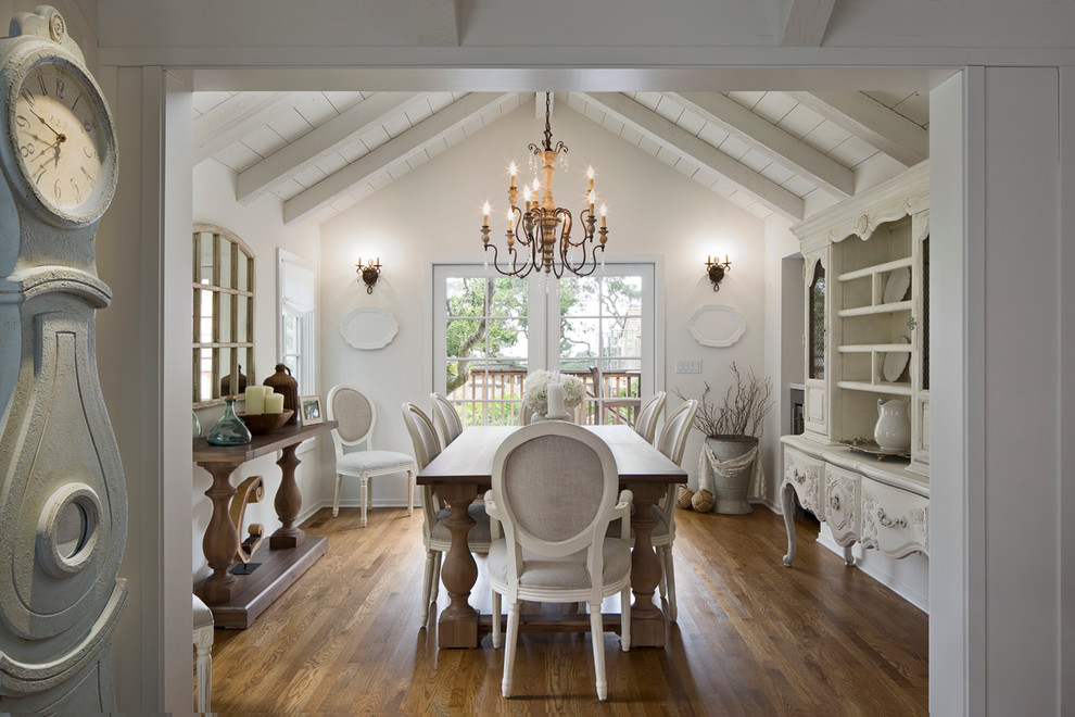 Design ideas for a large country enclosed dining room in Other with white walls, medium hardwood flooring, no fireplace and brown floors.
