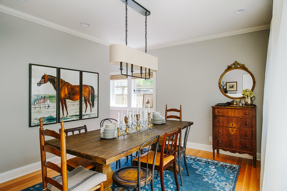 Traditional enclosed dining room in Seattle with grey walls and medium hardwood flooring.