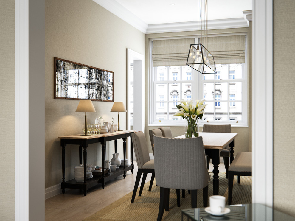 Design ideas for a classic dining room in London with feature lighting.