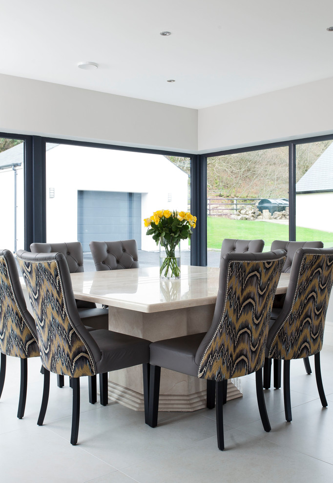 Inspiration for a contemporary dining room in Other with grey floors.