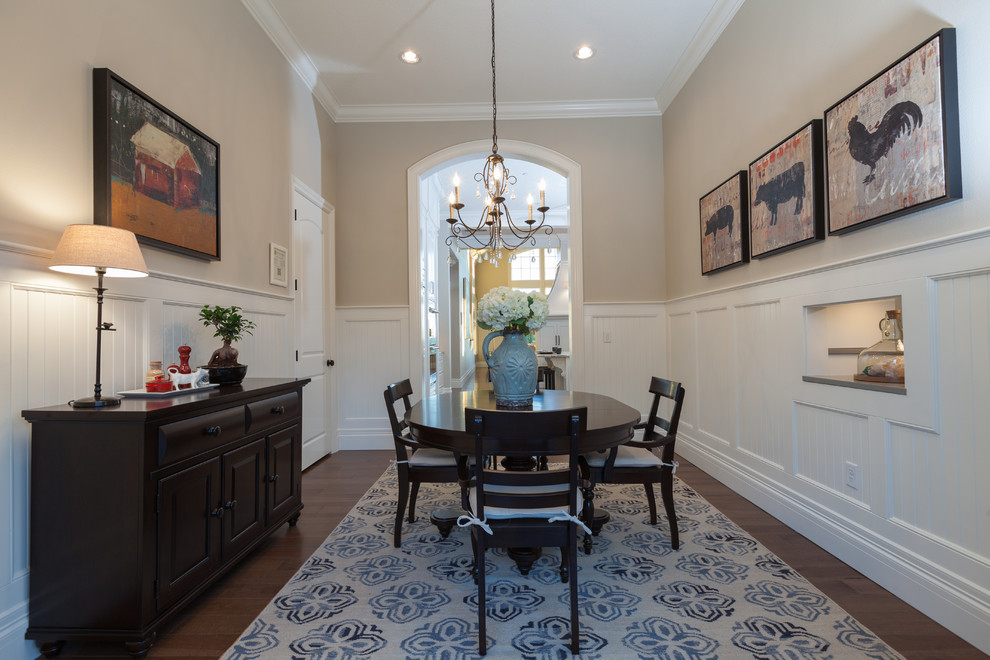 Photo of a classic enclosed dining room in Portland with beige walls and dark hardwood flooring.