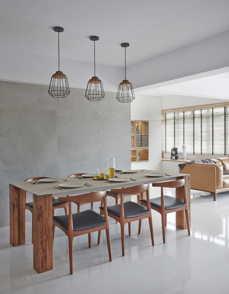 Свежая идея для дизайна: гостиная-столовая в современном стиле с серыми стенами и серым полом - отличное фото интерьера