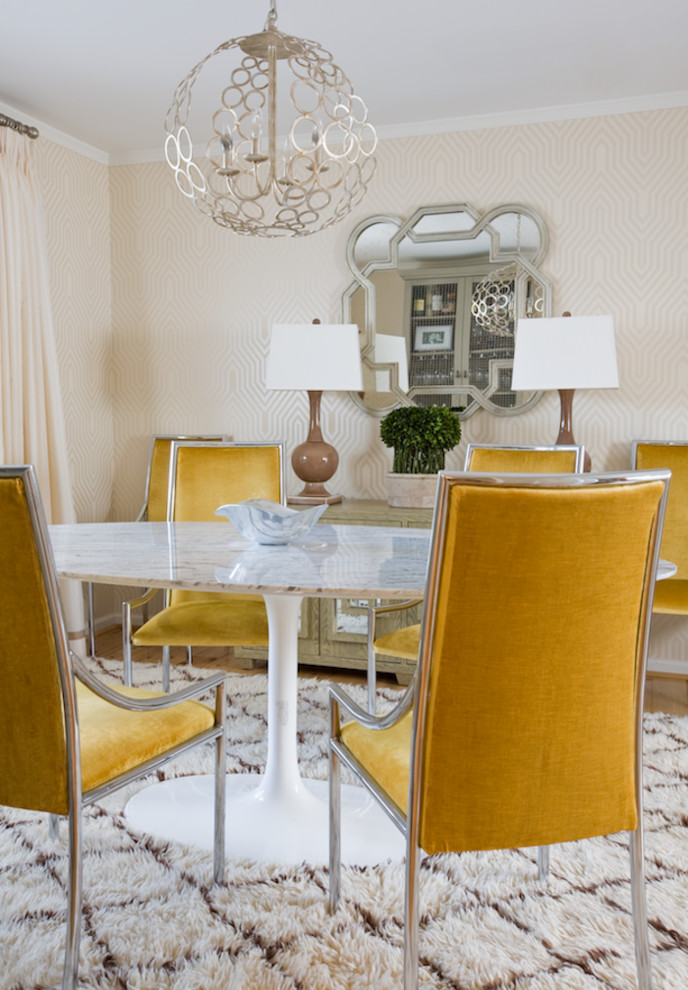 This is an example of a traditional dining room in DC Metro with beige walls.