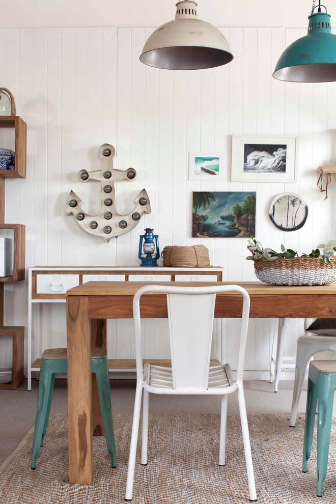 This is an example of a beach style dining room in Sydney.