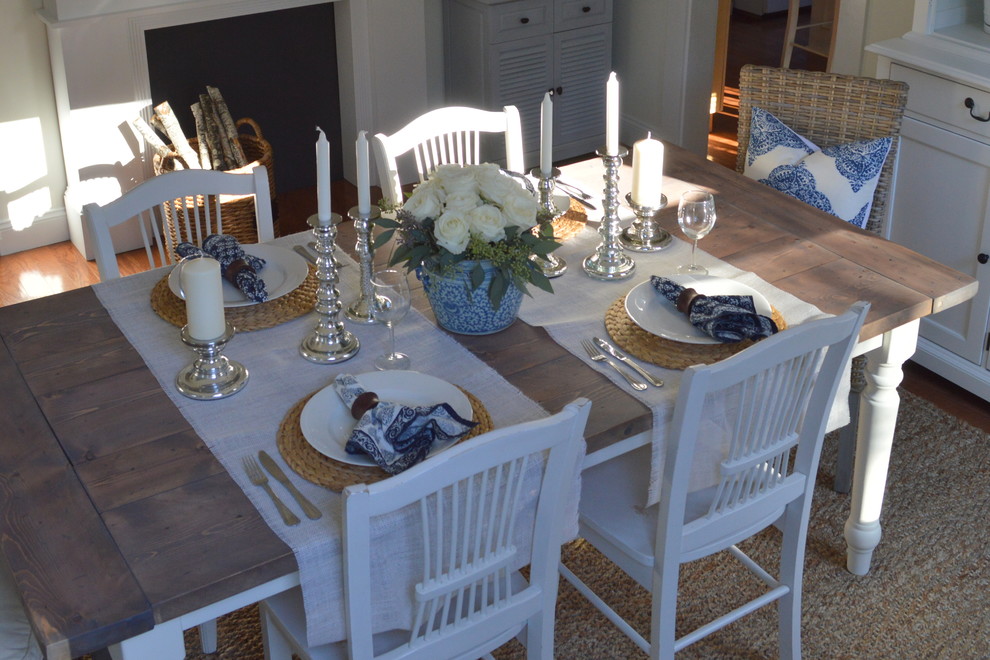 Example of a beach style dining room design in Boston