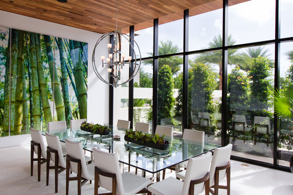 Design ideas for a large contemporary dining room in Miami with white walls and beige floors.
